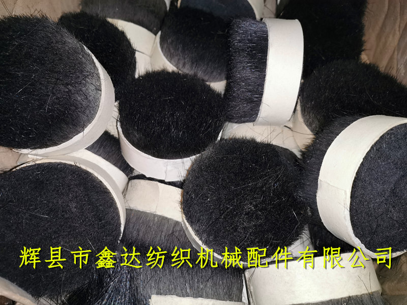 Textile equipment bristle and shuttle hair