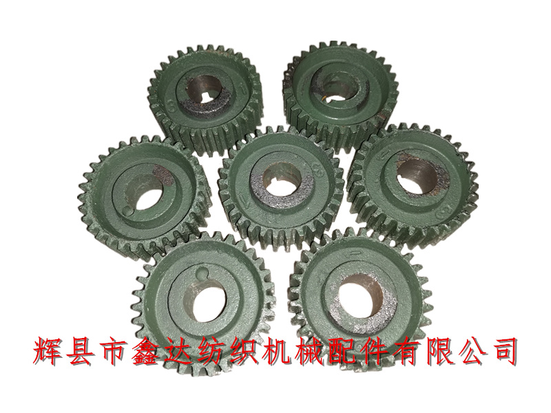 Textile weft density gear change tooth 31